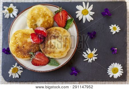A Large Plate With Curd Cheese For Breakfast, Cottage Cheese Pancakes, Curd Fritters With Fresh Berr