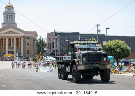Jasper, Indiana, Usa - August 5, 2018: The Strassenfest Parade, Man Driving A M939 Military Transpor