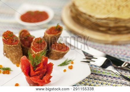 Traditional Russian Pancakes With Red Cavier And Honey