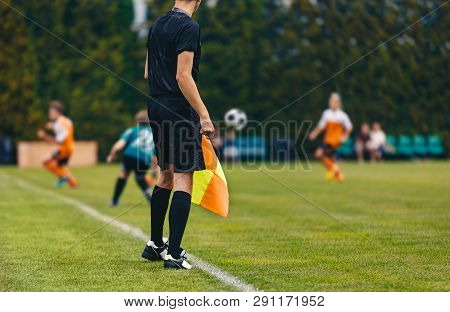 Soccer Line Referee; Football Linesman. Junior Football Match