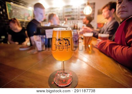 Copenhagen, Denmark - Sept 7: Bartender, Visitors Drinking Craft Beer, And Glass Of Danish Beer By M