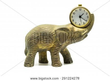 Isolated Bronze Anticue Elephant With A Clock On A White Background