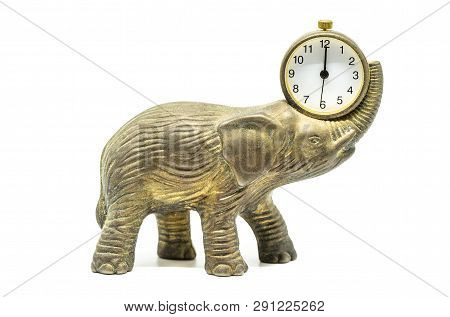 Isolated Bronze Anticue Elephant With A Clock On A White Background