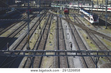 Parallel Railway Tracks Leading To The Station