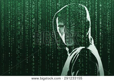 Anonymous Computer Hacker Over Abstract Digital Background. Obscured Dark Face In Mask And Hood. Dat