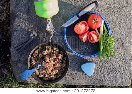 Lunch tourist. Tourist breakfast. Garnish and vegetables. Porridge and salad. Frame in frame.