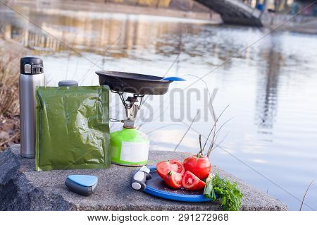 Camping. Rest and eating at the river