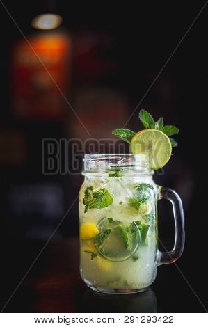 Mojito Cocktail In A Dark Ambient Bar