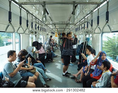 Jakarta, Indonesia - March 23, 2019: Passengers On The Train Of Mrt Jakarta At Lebak Bulus Mrt Stati