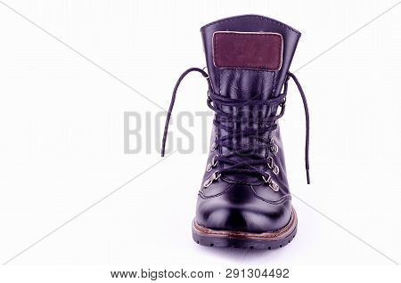 Beige Woman Long Boot Shoe Isolated On White Background. Fashionable Boots For Women May Exhibit All