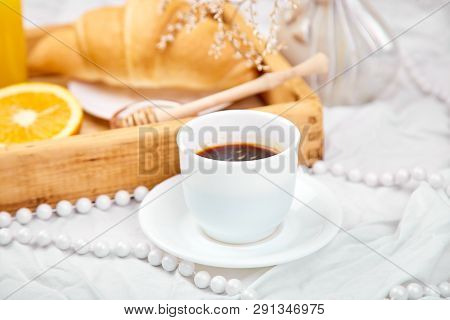 Good Morning. Continental Breakfast On White Bed Sheets.
