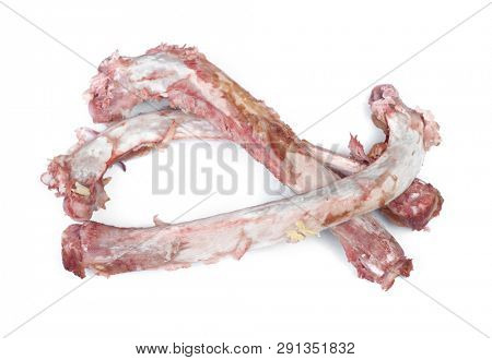 Group of bones with flesh isolated on white