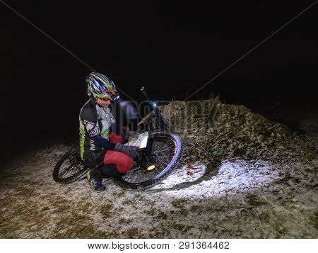 Winter Night Extreme Bike Racer Control Navigation And The Map.  January 25th 2019, Novy Bor, Czech 