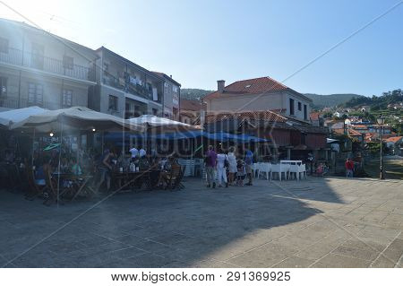 Square With Magnificent Stone Horreos In The Beautiful Village Of Combarrro. Nature, Architecture, H
