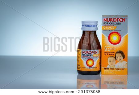Chonburi, Thailand-october 27, 2018 : Nurofen In Amber Bottle On Gradient Background. Ibuprofen Oral