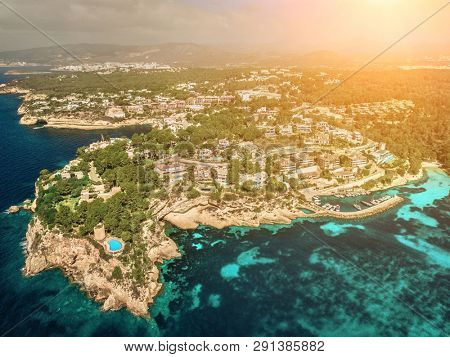 Beautiful birdeye view on the sea coastline with pier and yakhts at sunny day. Travell, jorney,islands, Seascape, freedom, holidays concept.