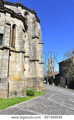 Mendicant Gothic (spanish Gothic) Landmark. Santo Domingo Church And Convent Apse With Trees And Bel