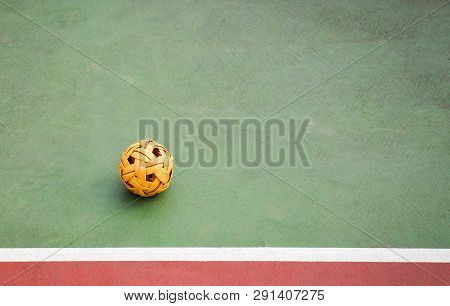 Sepak Takraw Ball Or Rattan Ball On Field Of Sepak Takraw Court With Line On Sport Outdoors