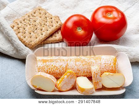 Fagotin Cheese With  Orange Coloured Rind Made From Cow Milk In Caves Of Maredsous Abbey, Belgium