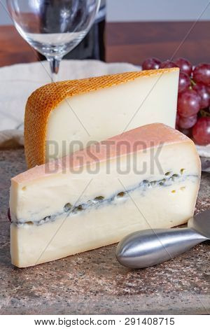 Marble Plate With Sheep Milk Cheese Pur Brebis And Morbier Cow Milk Cheese, France Cheeses Served As