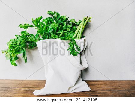 Zero Waste Use Less Plastic Concept / Fresh Vegetables Organic In Eco Cotton Fabric Bags On Wooden T