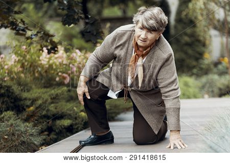 Sick Senior Woman With Breathlessness Waiting For Support