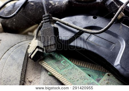 Retro Gamepad, Controller And Game Console Covered Vith Dirt And Dust. Obsolete And Outdated Technol
