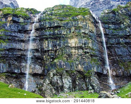Nameless Waterfalls Under The Alpine Peaks Glarner Vorab And Bünder Vorab In The Valley Of Im Loch -