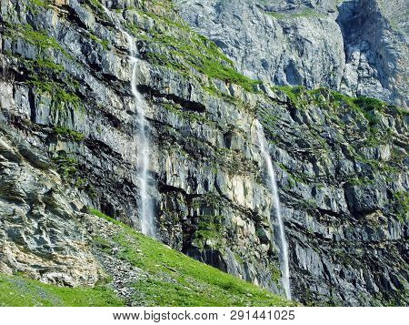 Nameless Waterfalls Under The Alpine Peaks Glarner Vorab And Bünder Vorab In The Valley Of Im Loch -