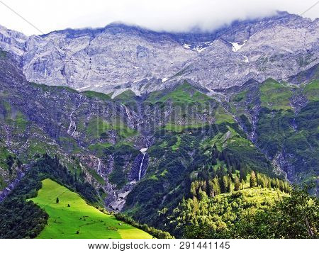 Nameless Waterfalls Under The Alpine Peaks Glarner Vorab And Bünder Vorab In The Valley Of Im Loch -