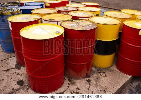 Colored Metal Barrels. Blue Oil Drums Containing Fuel For Transportation