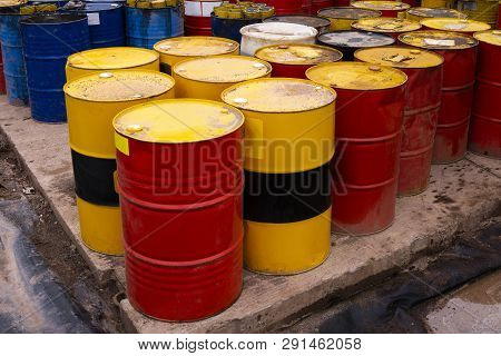 Colored Metal Barrels. Blue Oil Drums Containing Fuel For Transportation