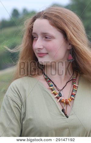 KIEV, UKRAINE - JULY 31: Member of history club Golden Capricorn wears medieval costume as she participates in historical festival and camp in memory of King Vladimir July 31, 2009 in Kiev, Ukraine.