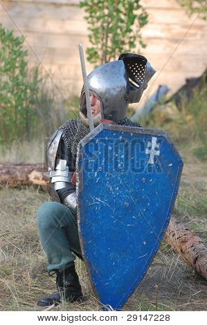 KIEV, UKRAINE - JULY 31: Member of history club Golden Capricorn wears medieval costume as he participates in historical festival and camp in memory of King Vladimir July 31, 2009 in Kiev, Ukraine.