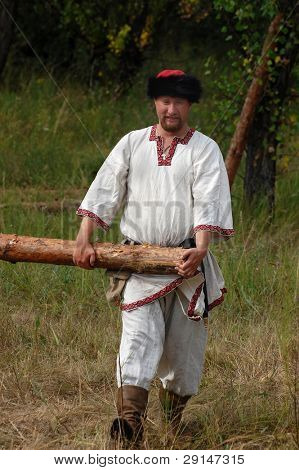 KIEV, UKRAINE - JULY 31: Member of history club Golden Capricorn wears medieval costume as he participates in historical festival and camp in memory of King Vladimir July 31, 2009 in Kiev, Ukraine.