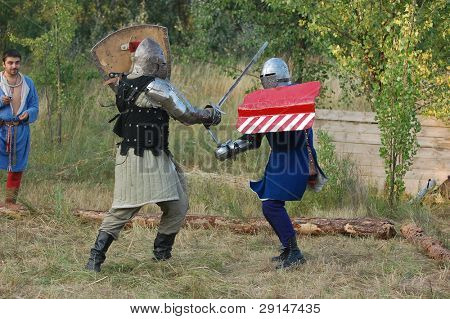 KIEV, UKRAINE - JULY 31: Member of history club Golden Capricorn wears medieval costume as he participates in historical festival and camp in memory of King Vladimir July 31, 2009 in Kiev, Ukraine.