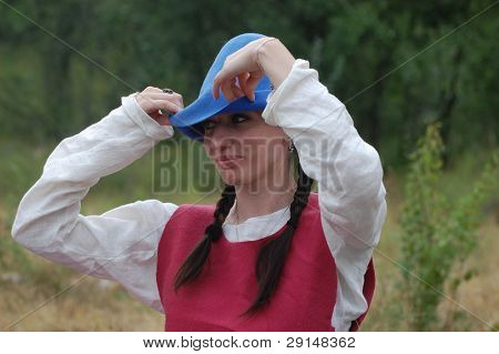  KIEV, UKRAINE - JULY 31: Member of history club Golden Capricorn wears medieval costume as she participates in historical festival in memory of King Vladimir July 31, 2009 in Kiev, Ukraine.