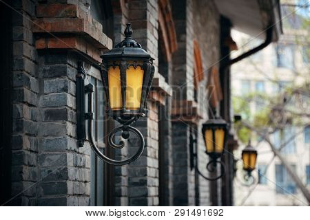 Road lamp and wall window patterns in Xiahao Old street in Chongqing, China.