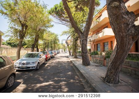 Santa Teresa Gallura, Sardinia, Italy - July 9, 2018: Street in Santa Teresa Gallura City, Sardinia, Italy. Police Station.