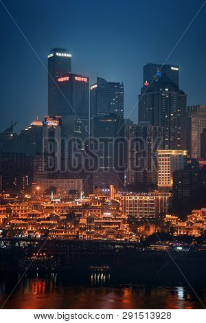 CHONGQING, CHINA â MARCH 13: Hongyadong shopping complex at night on March 13, 2018 in Chongqing. With 17M population, it is the most populous Chinese municipality.