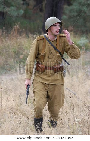 KIEV, UKRAINE - SEPT 19, : Member of a history club wear historical Soviet  uniforms as he participates in a WWII reenactment.Buttle for Kiev in 1943. September 19 , 2009 in Kiev, Ukraine