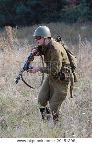 KIEV, UKRAINE - SEPT 19, : Member of a history club wear historical Soviet  uniforms as he participates in a WWII reenactment.Buttle for Kiev in 1943. September 19 , 2009 in Kiev, Ukraine