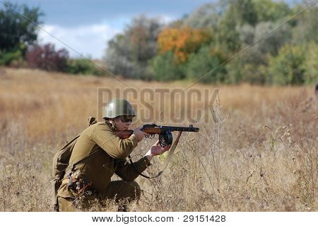 KIEV, UKRAINE - SEPT 19, : Member of a history club wear historical Soviet  uniforms as he participates in a WWII reenactment.Buttle for Kiev in 1943. September 19 , 2009 in Kiev, Ukraine