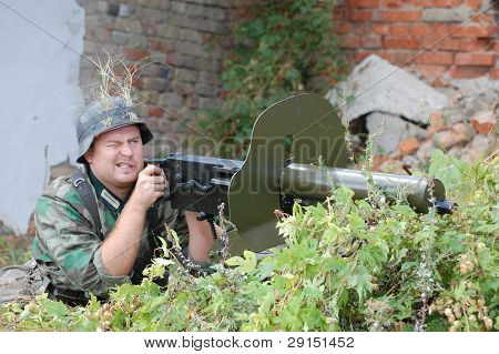 KIEV, UKRAINE - SEPT 19, : Member of a history club wear historical German uniforms as he participates in a WWII reenactment.Buttle for Kiev in 1943. September 19 , 2009 in Kiev, Ukraine