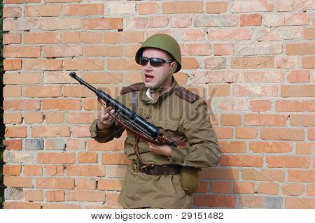 KIEV, UKRAINE - SEPT 19, : Member of a history club wear historical Soviet  uniforms as he participates in a WWII reenactment.Buttle for Kiev in 1943. September 19 , 2009 in Kiev, Ukraine