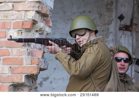 KIEV, UKRAINE - SEPT 19, : Member of a history club wear historical Soviet  uniforms as he participates in a WWII reenactment.Buttle for Kiev in 1943. September 19 , 2009 in Kiev, Ukraine