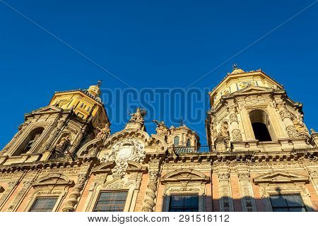 Golden Early Morning Light Falling On The Facade Of The Church Of San Luis De Los Franceses In Sevil