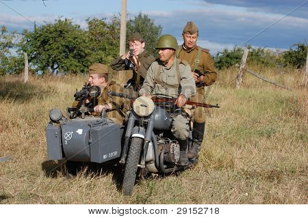 KIEV, UKRAINE - SEPT 19, : Members of a history club wear historical  uniforms as they participates in a WWII reenactment.Buttle for Kiev in 1943. September 19 , 2009 in Kiev, Ukraine