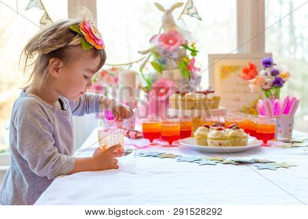 Little Toddler Girl Eating Dessert After Easter Dinner
