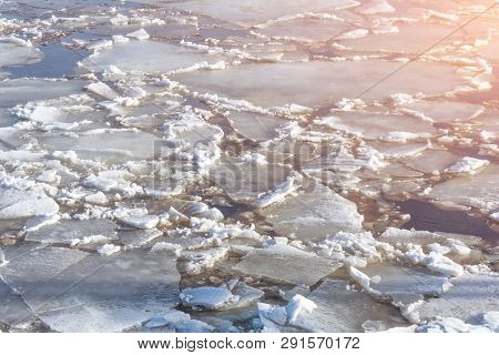Spring Ice Drifting On The River On A Sunny Day. Background Texture